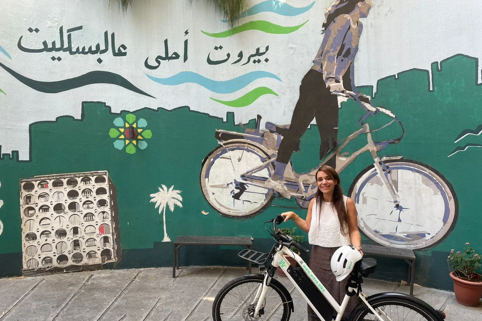 Joyce Hamze, CEO of Wave, with an electric bike from the Beirut-based subscription service